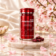Sakureva Premium NMN bottle on marble pedestal with Sakura blossoms and capsules